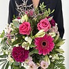 Zartschimmer Ein harmonischer Strauß in unterschiedlichen Rosa und Lilatönen.