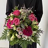 Zartschimmer Ein harmonischer Strauß in unterschiedlichen Rosa und Lilatönen.
