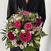 Zartschimmer Ein harmonischer Strauß in unterschiedlichen Rosa und Lilatönen.